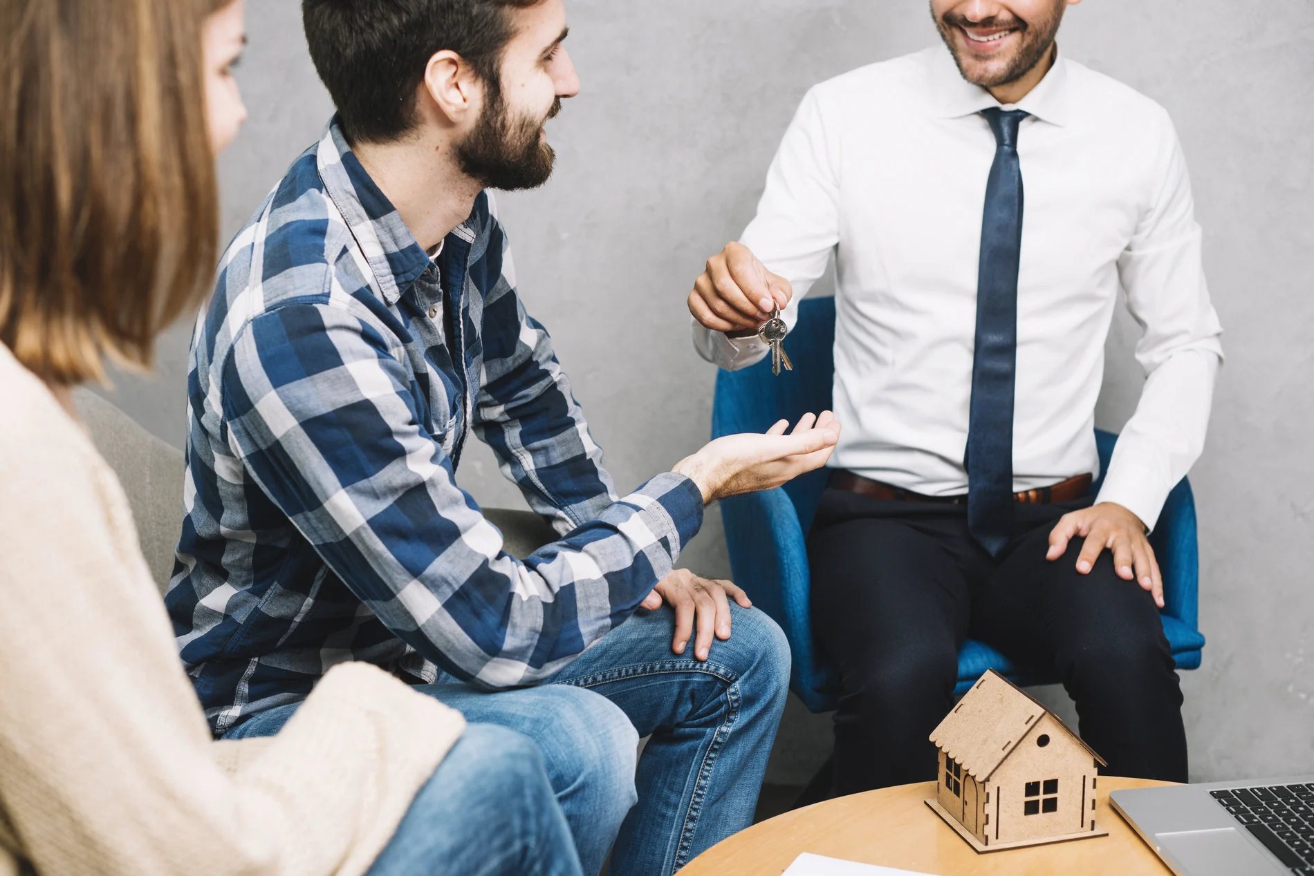 Homebuyers consulting with a trusted South Florida real estate agent 